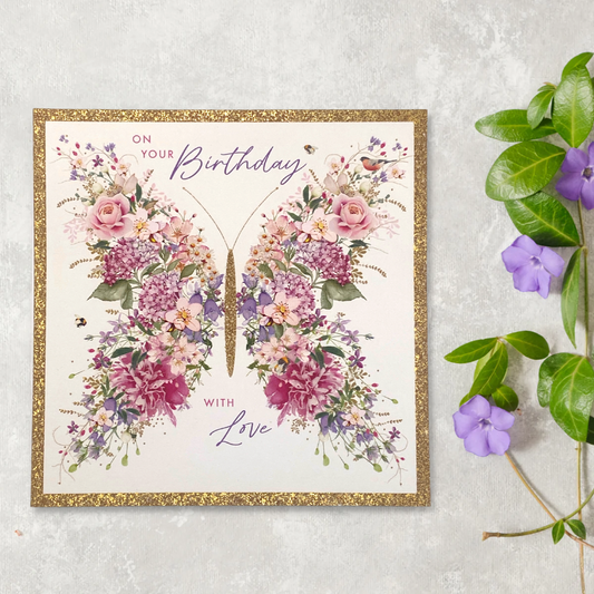 Front image showing floral butterfly with gold glitter border