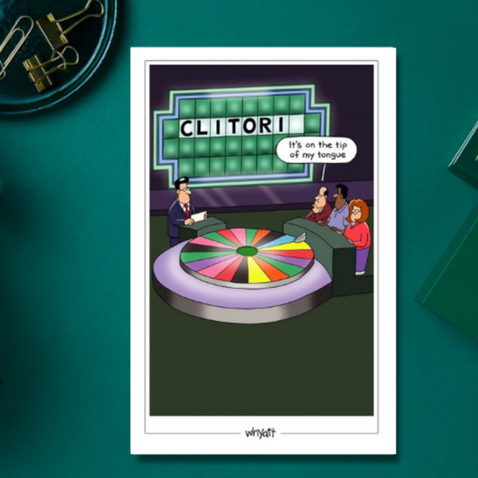 Wheel of fortune theme card with the word spelling clitoris