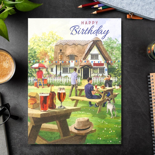 Front image showing pub garden, men, dog and bunting