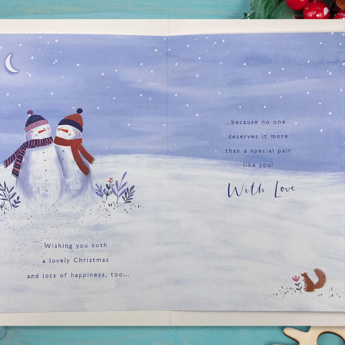 Inside with full colour printed image of snowmen and verse