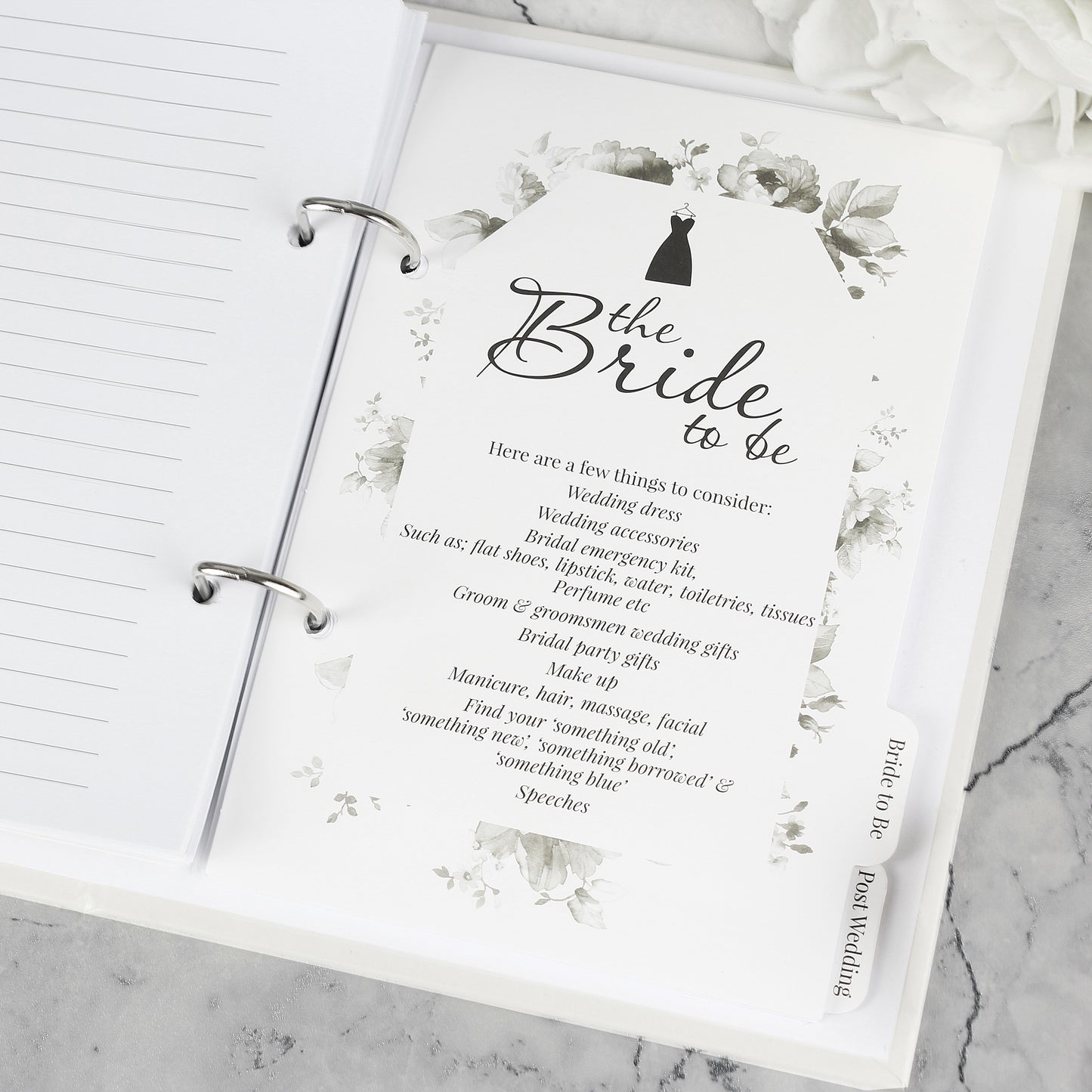 Card titled 'The Bride to Be' on a marble surface