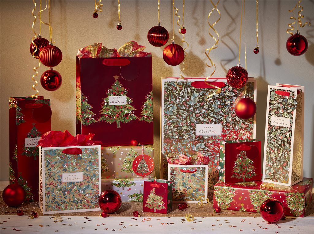 Image Showing Presents Wrapped Using Festive Tree Red Gift Bags