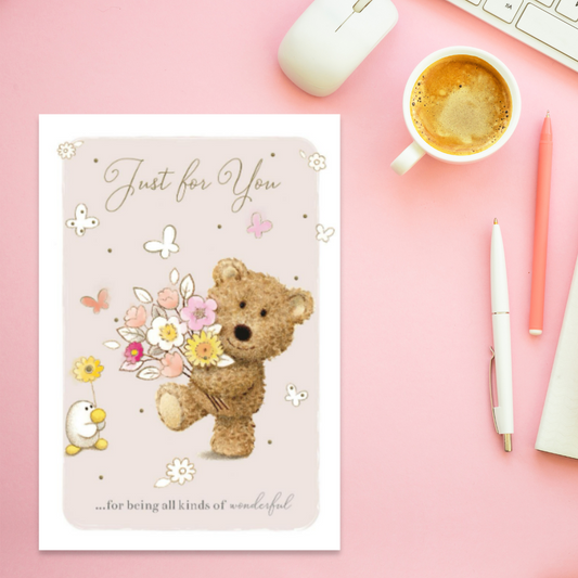 Cute Barley bear character holding a bunch of flowers with white border