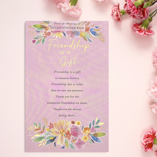 Pink card with floral design and verse with gold details