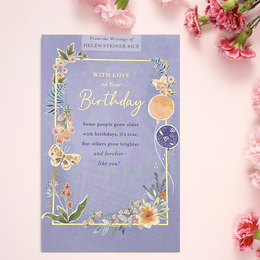Lilac card with flowers, balloons and butterflies around verse and gold foil details