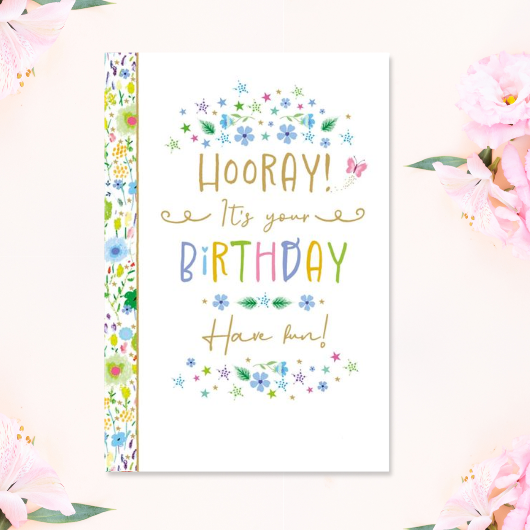 White card with floral border and pretty coloured text