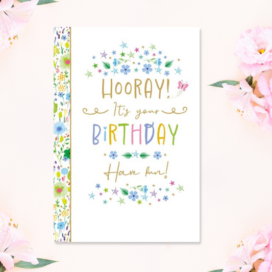 White card with floral border and pretty coloured text