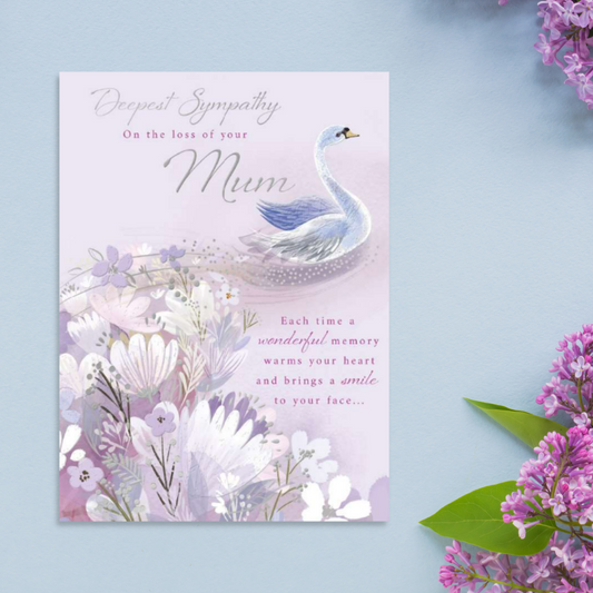 Lilac card with white swan among the flowers