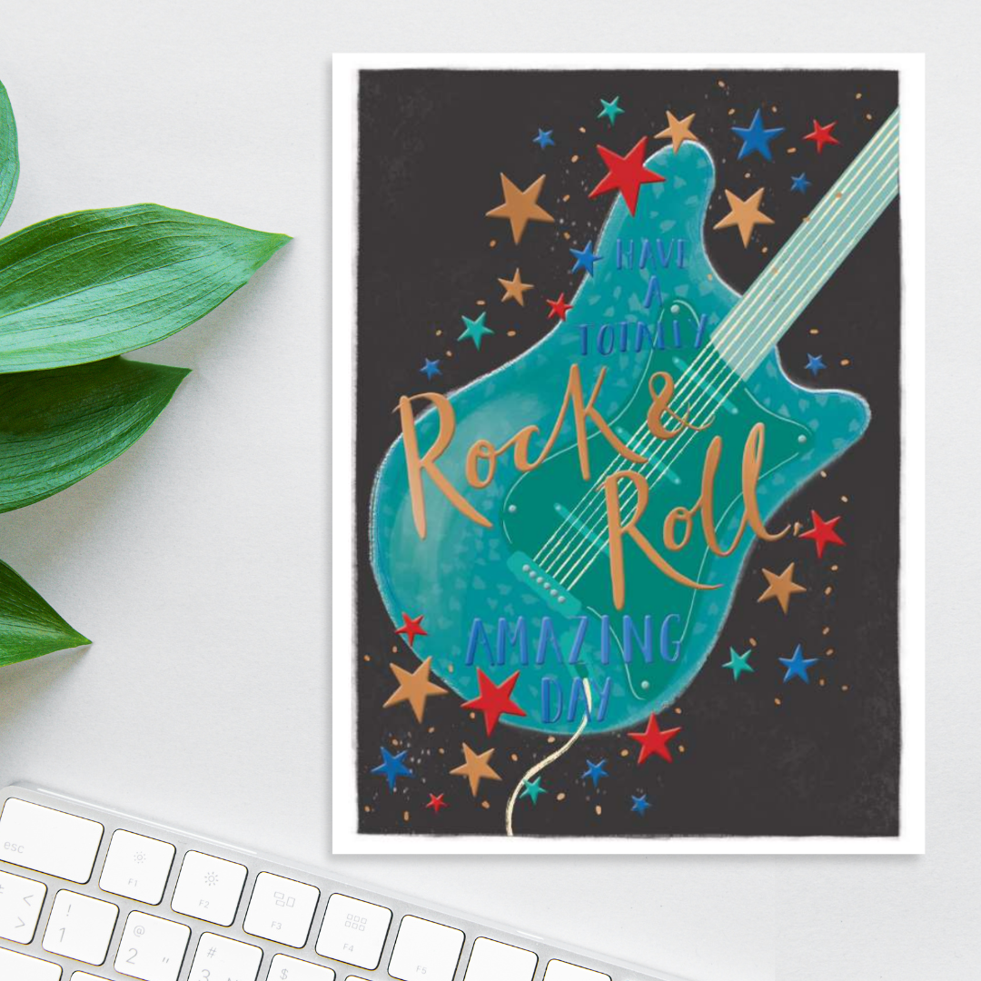 Navy card with green and blue guitar and stars