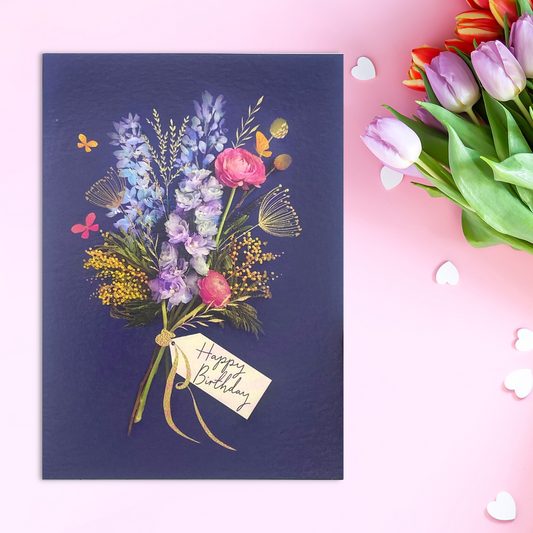 Navy card with flat lay arrangement of spring bouquet