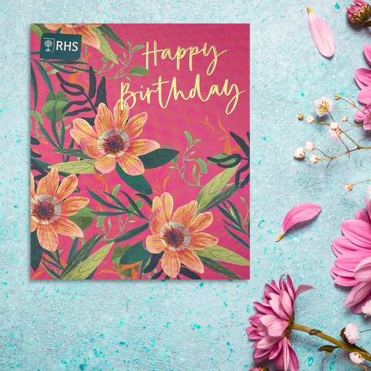 Pink square card with vibrant flowers and gold text
