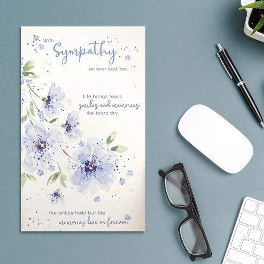 White card with flowers and poem, and blue foil text.