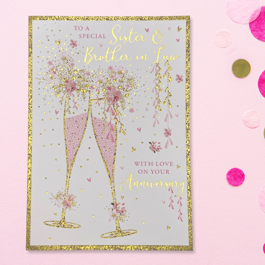 Front Card image with gold glitter border and pink and gold flutes