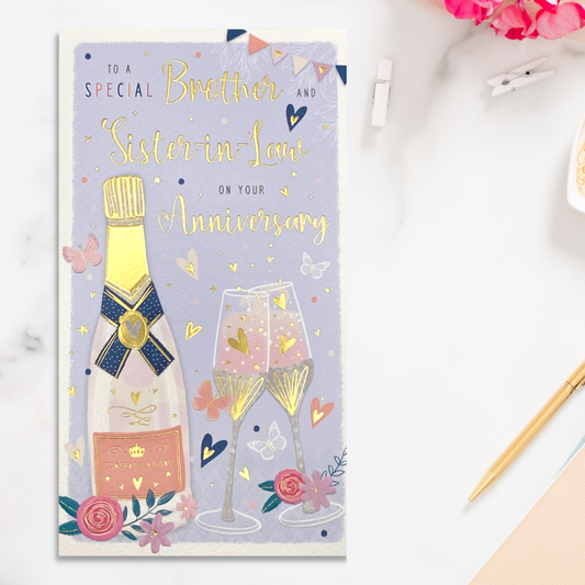 Slim card with lilac theme, bottle of bubbly and flutes with gold details