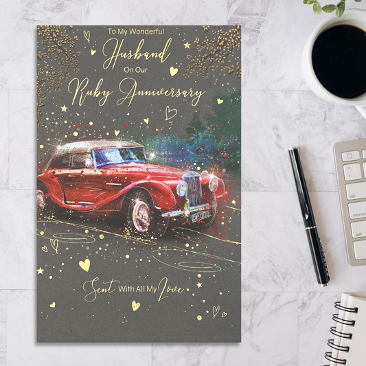 Grey card with red classic card and gold foil details