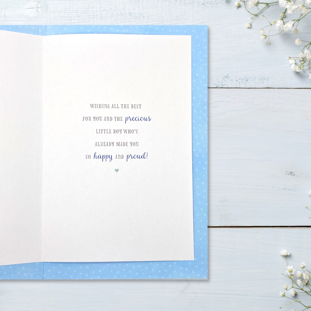 Inside image with blue polka dot border and verse