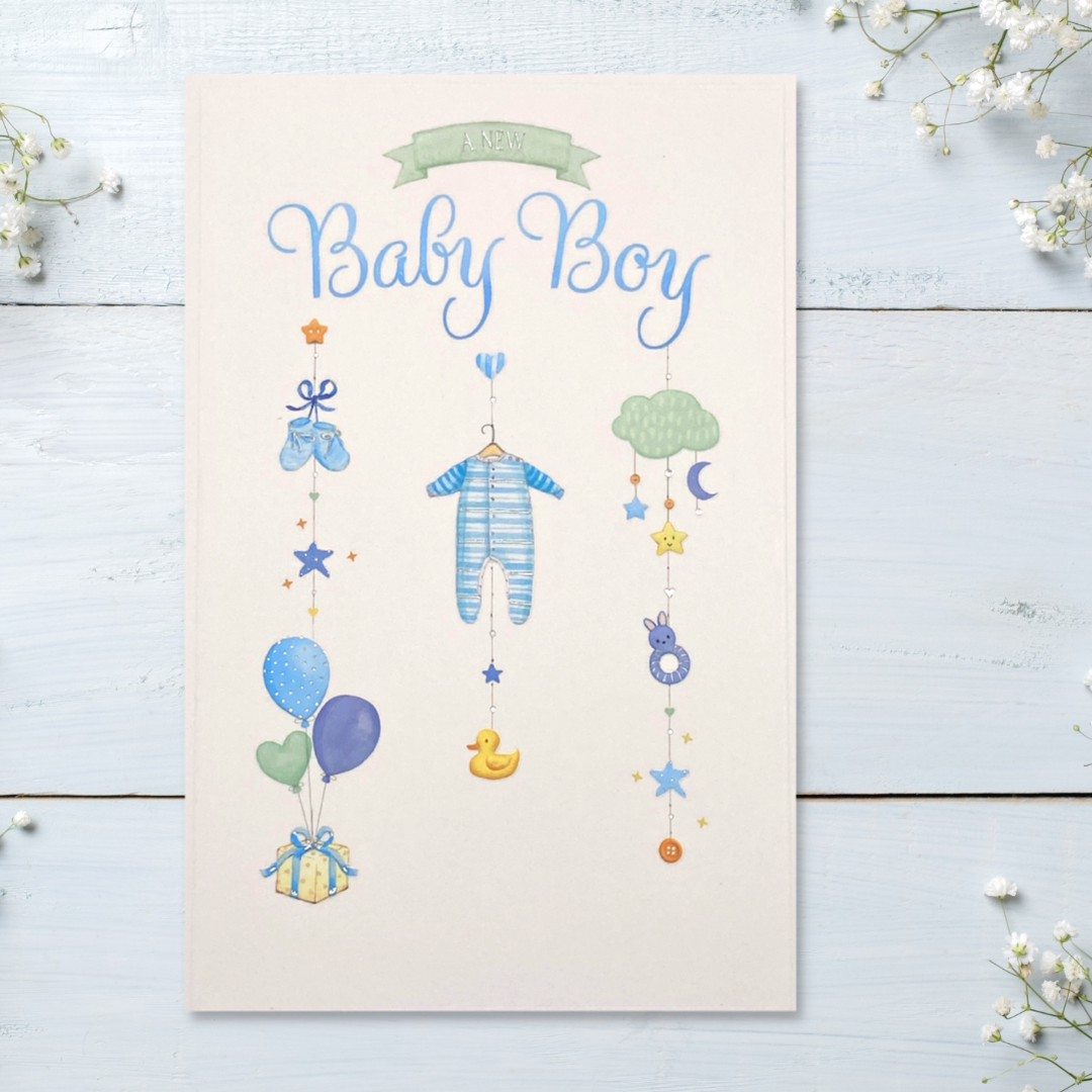 Front image showing baby mobile with hanging blue objects