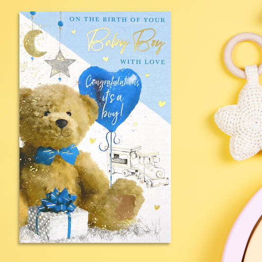 Front image with bear, balloon and gift with train set
