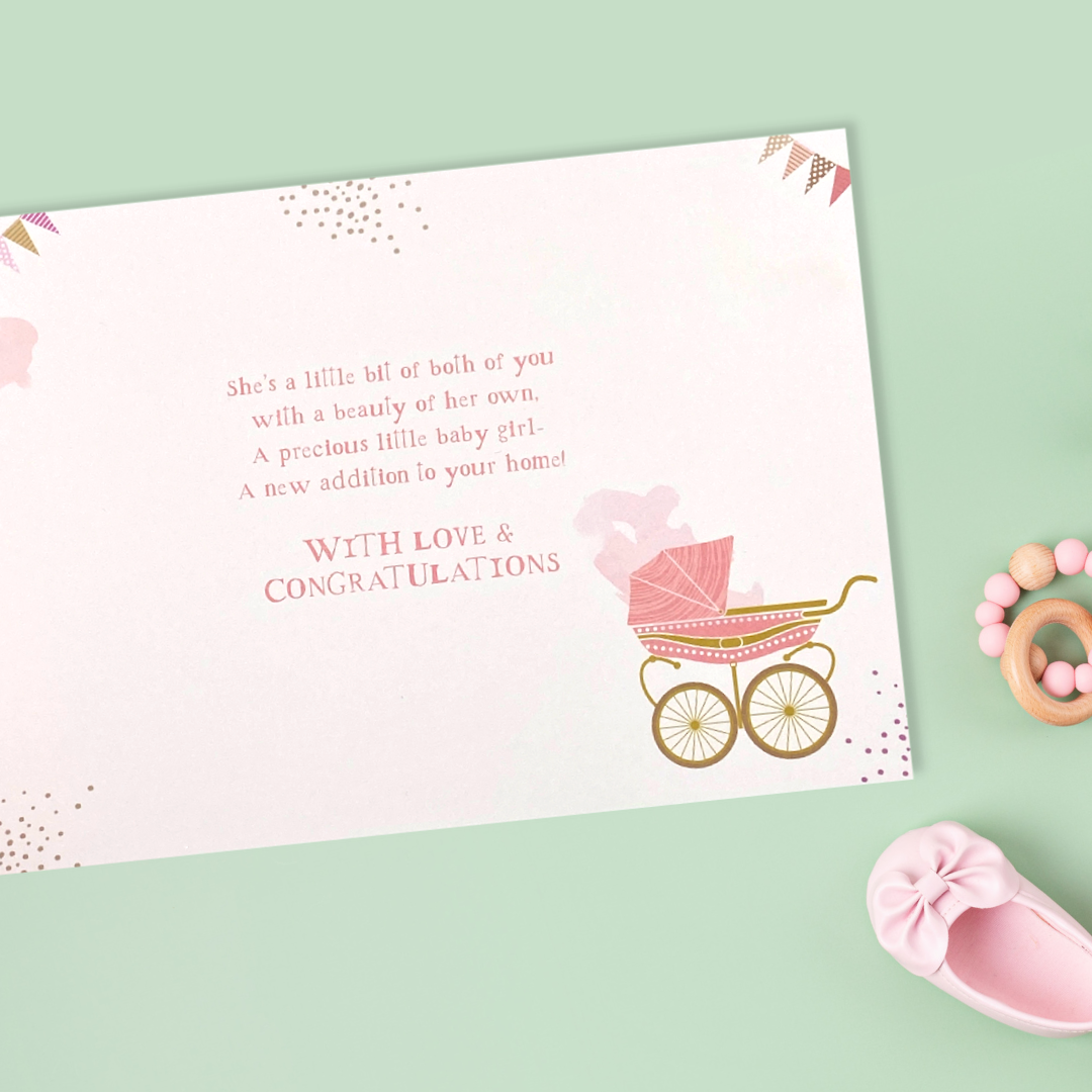 Inside image with pink and gold pram and pink verse