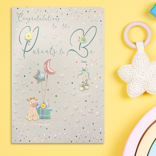 Front image with embossed hearts and cute giraffe, booties and balloons