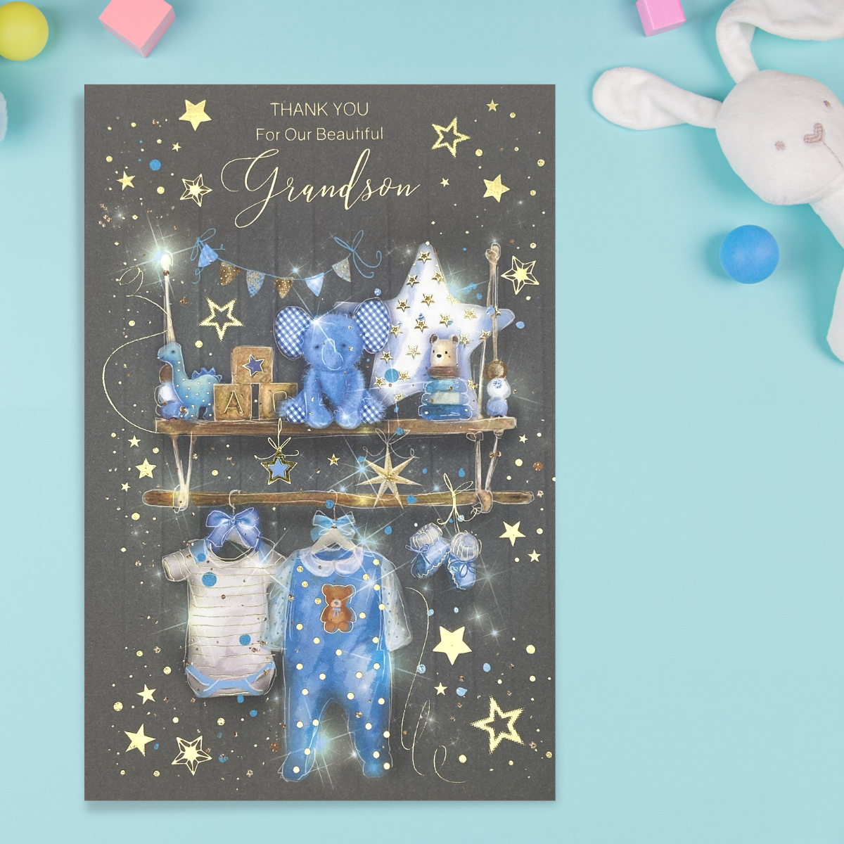 Grey card with blue toys, clothes and gifts on decorated shelves