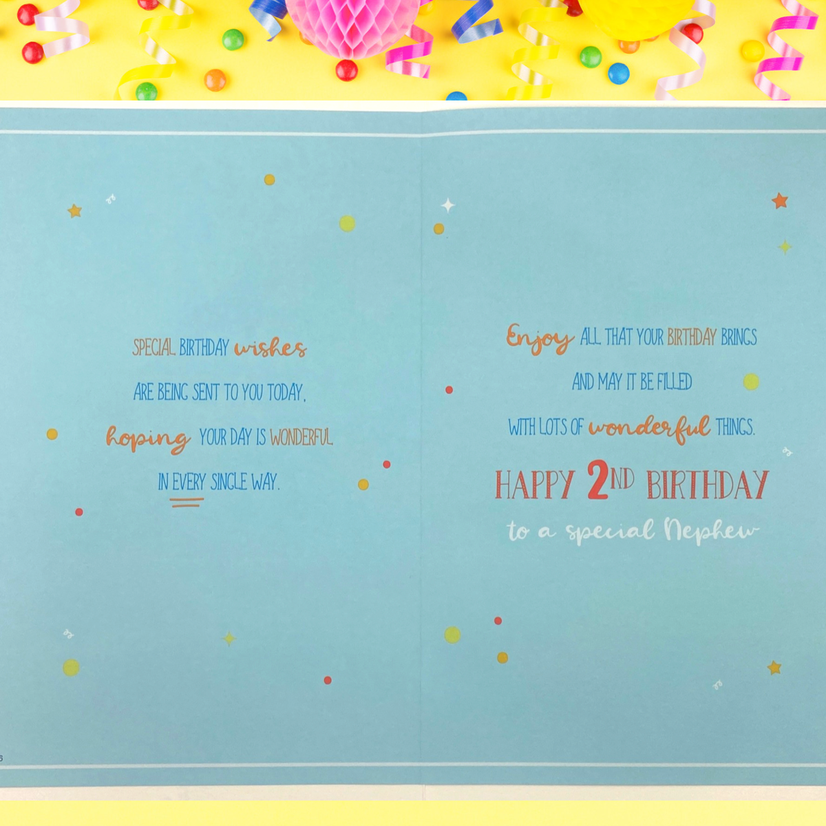 Inside blue themed card with two pages of verse and illustrations