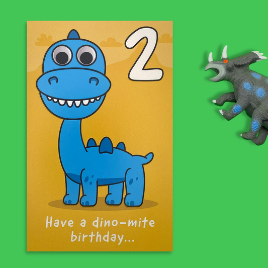 Front image showing yellow card with cute blue dinosaur