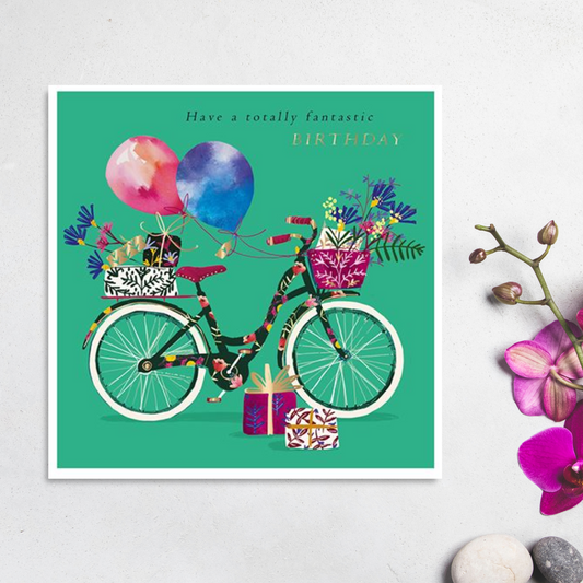 Square green card with floral bike and balloons