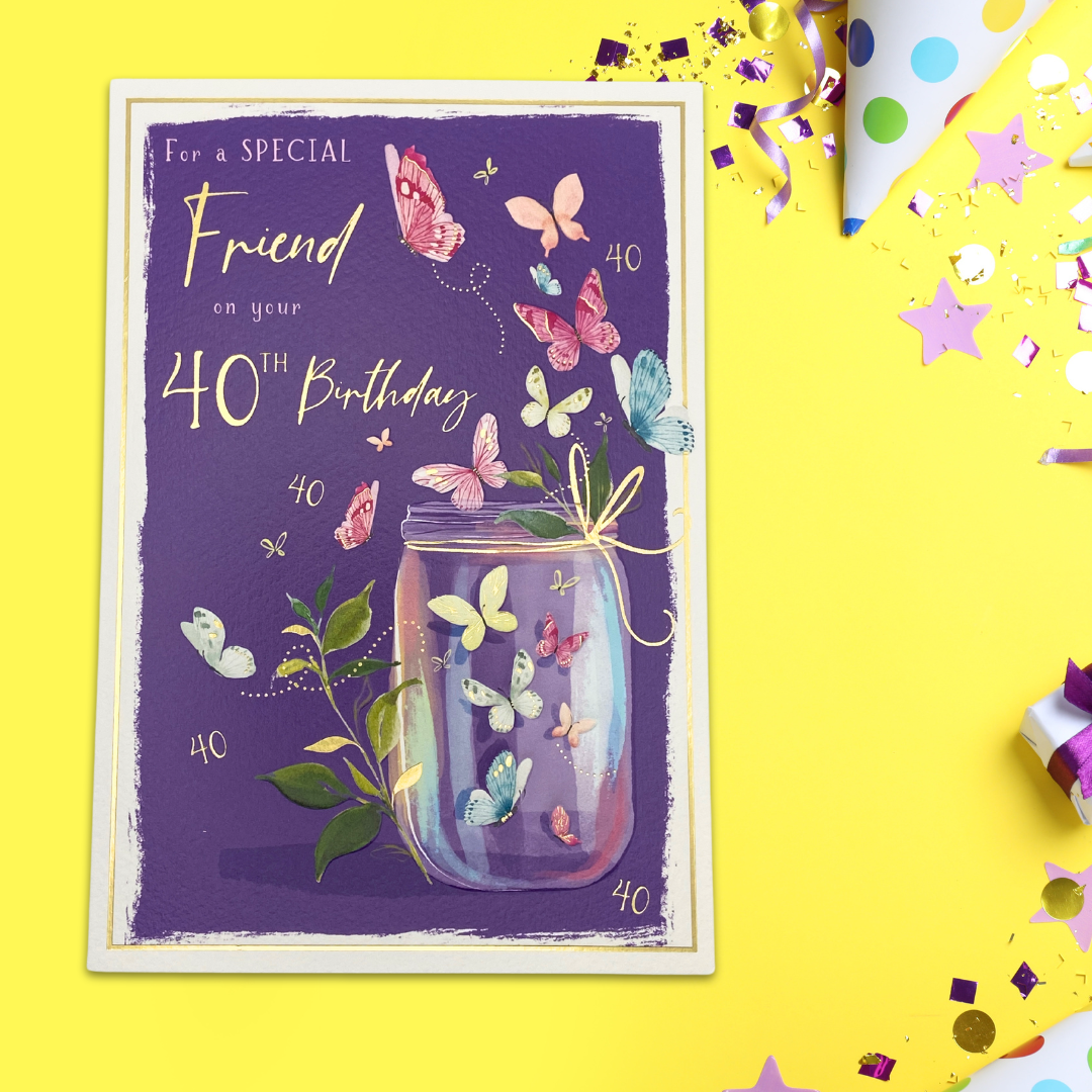 Purple card with brightly coloured butterflies and gold foil text