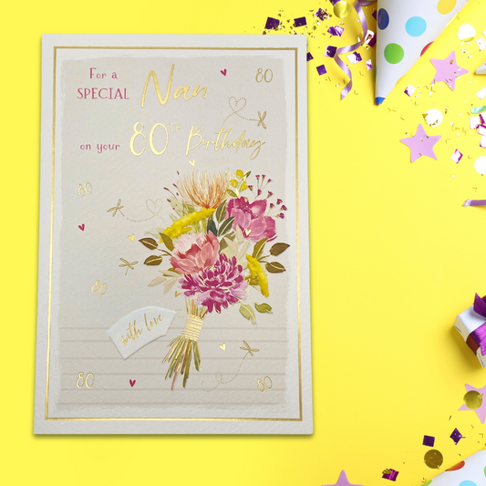 White card with pink and yellow hand tied bouquet, with gold foil text and border