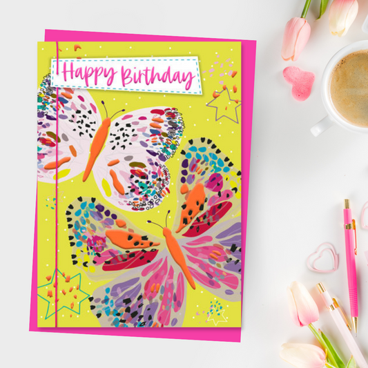 Brightly coloured butterflies with neon pink ribbon and details