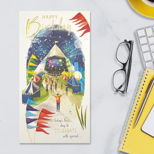 Slim white card with festival scene and stage at night