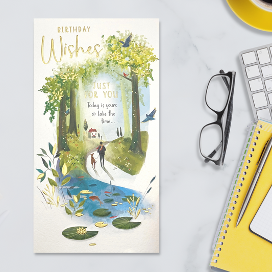 Slim white card with dog walk illustration and gold foil text