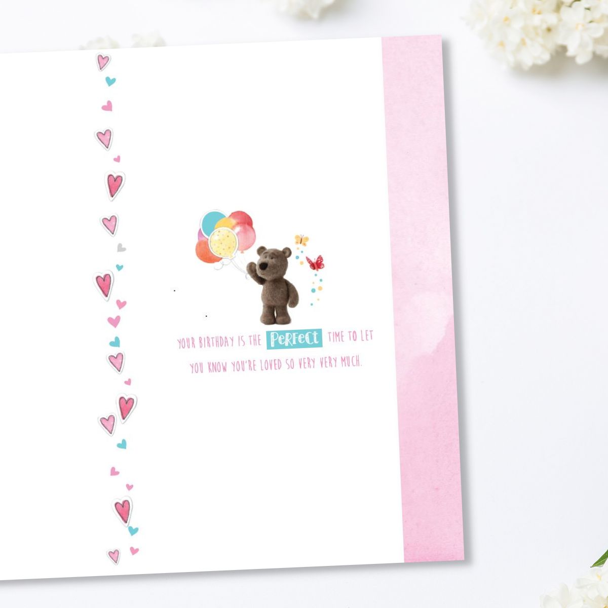 Inside image with Barley Bear and balloons, hearts and verse