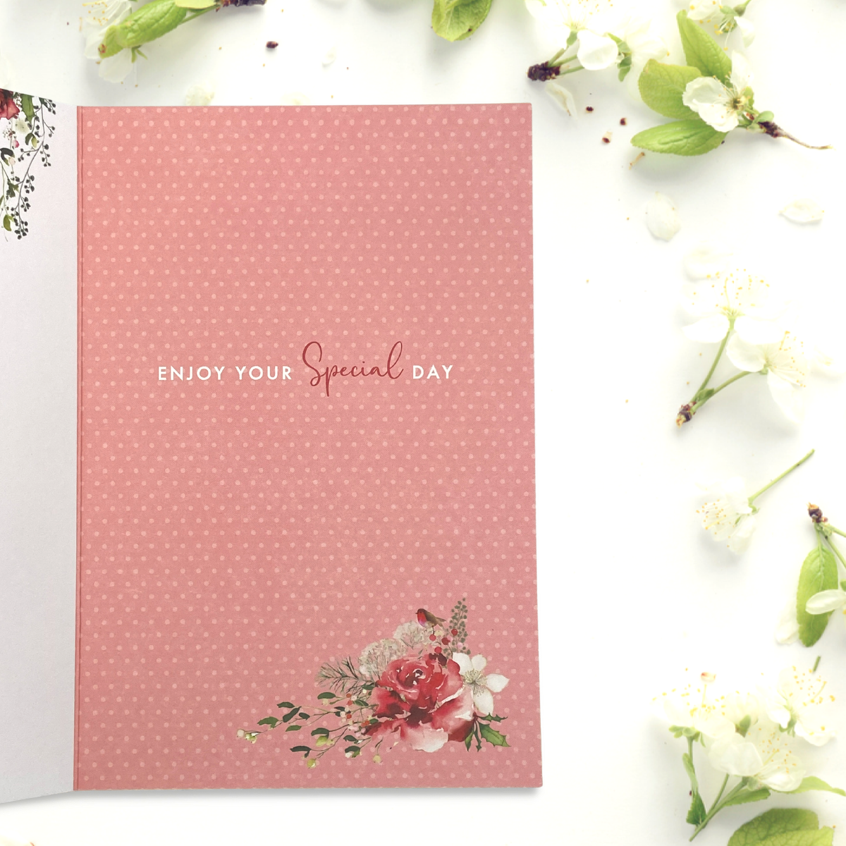 Inside image with red background and floral details verse