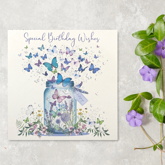 Blue and lilac butterflies around mason jar design