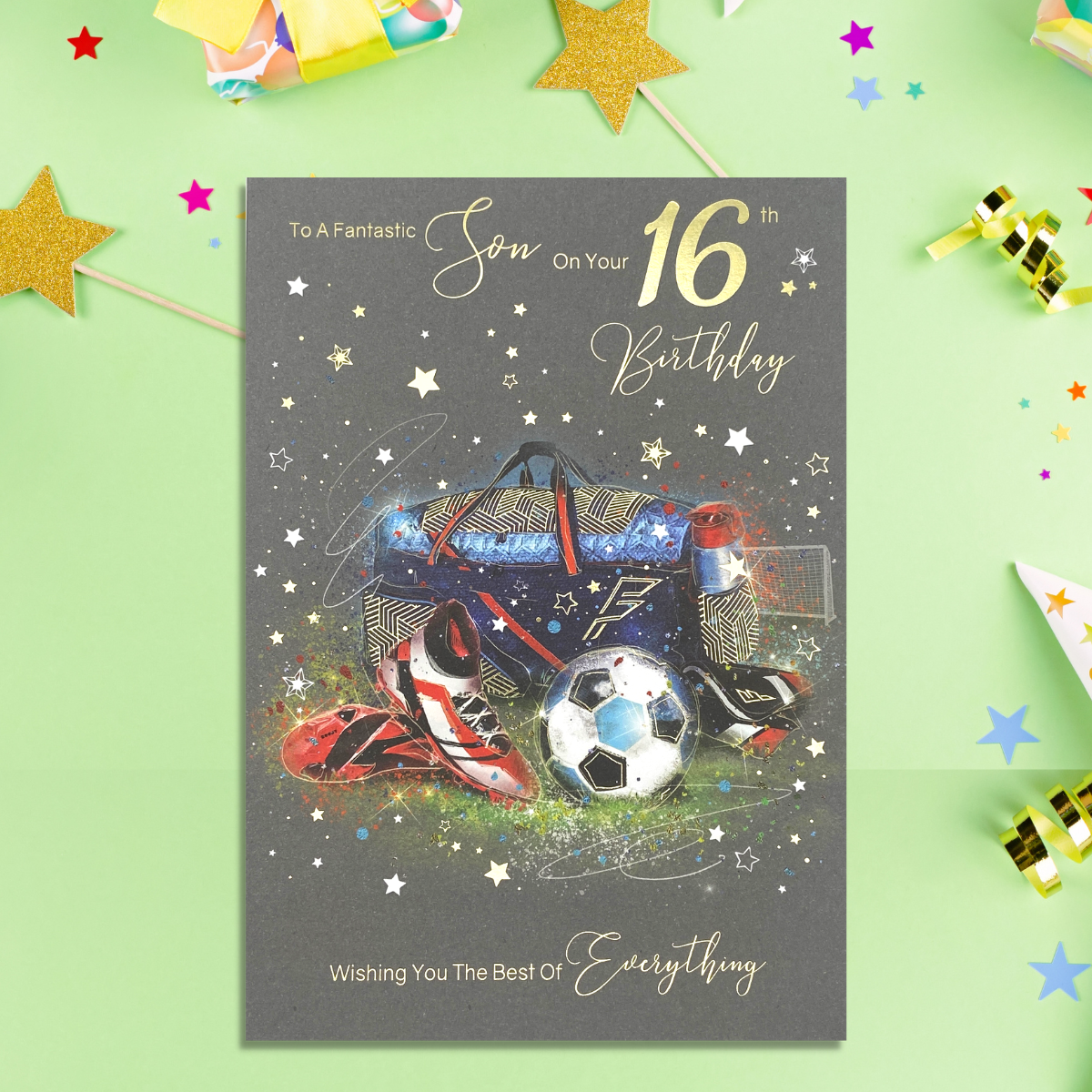 Large grey card with football boots, ball and kit bag with gold foil finish and text