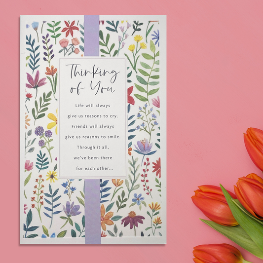 White card with floral design and sentimental verse