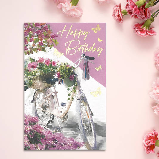 Pink and white card with floral bike and gold foil details