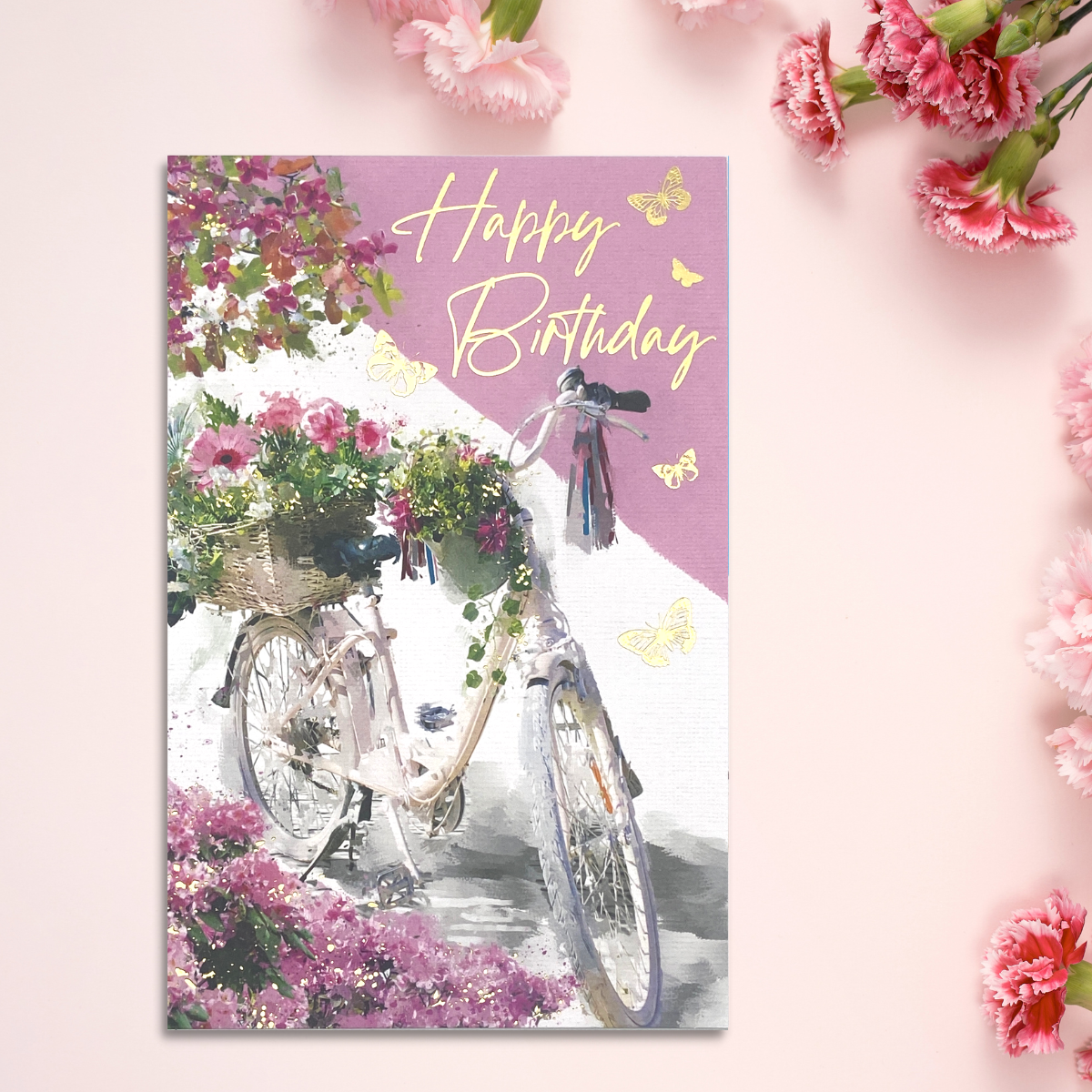 Pink and white card with floral bike and gold foil details