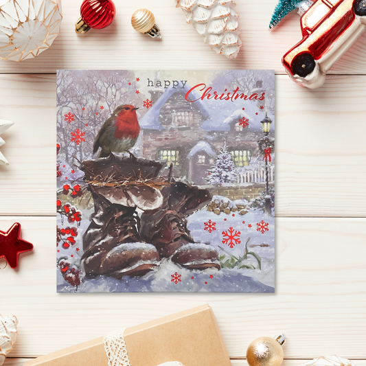 Robin perched on boots in snow, square card