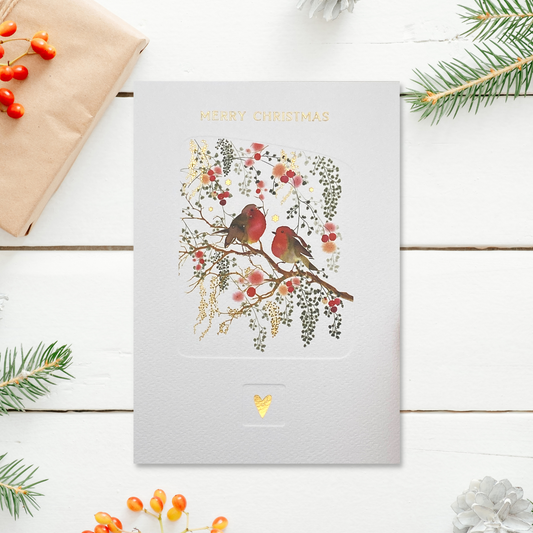 White card with two robins on branch with berries and gold heart