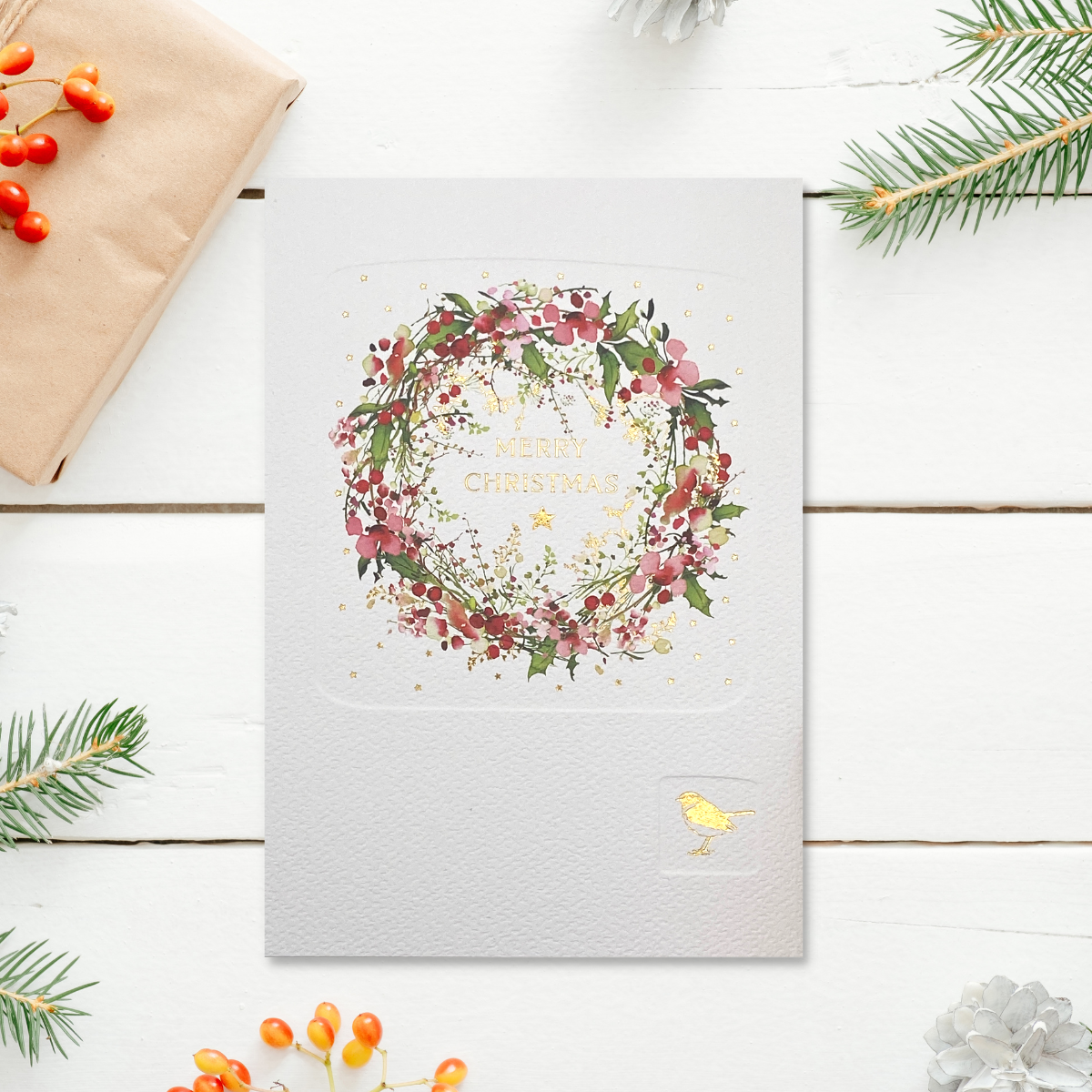 Floral wreath with gold text and robin on white embossed card