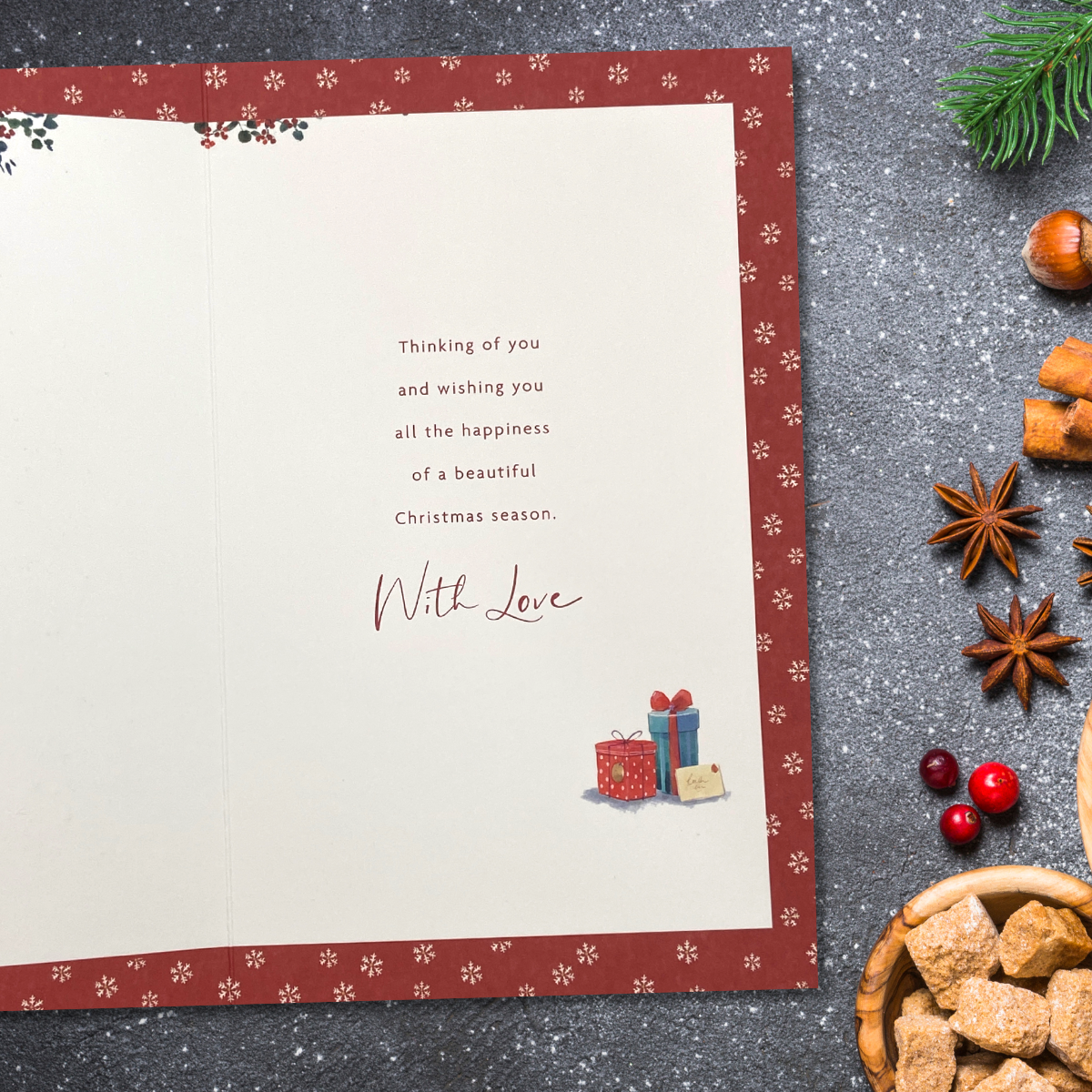 Inside image with red snowflake border and verse