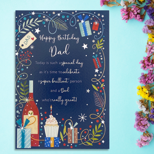 Front image with navy card, bottle, cake and gifts with verse and border