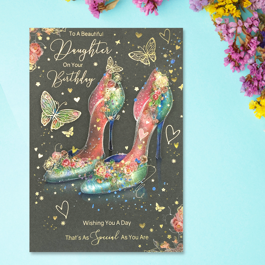 Front image showing pair of green and pink shoes with flowers and butterflies, gold foil and flitter