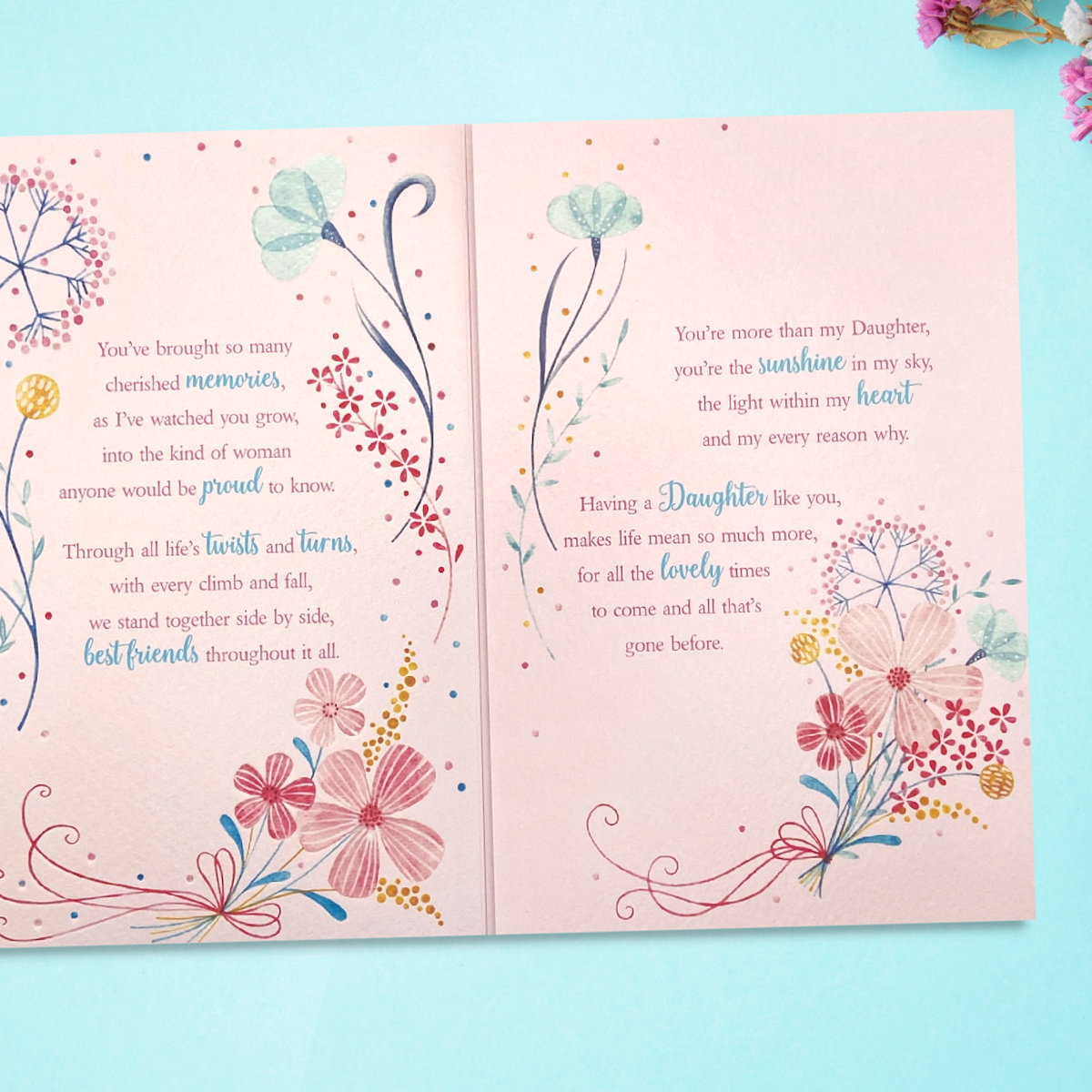 Two further pages with verse and floral decorations