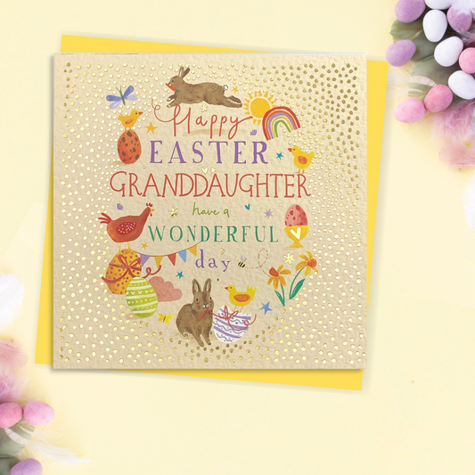 Yellow card with gold foil dots border and colourful text and bunnies