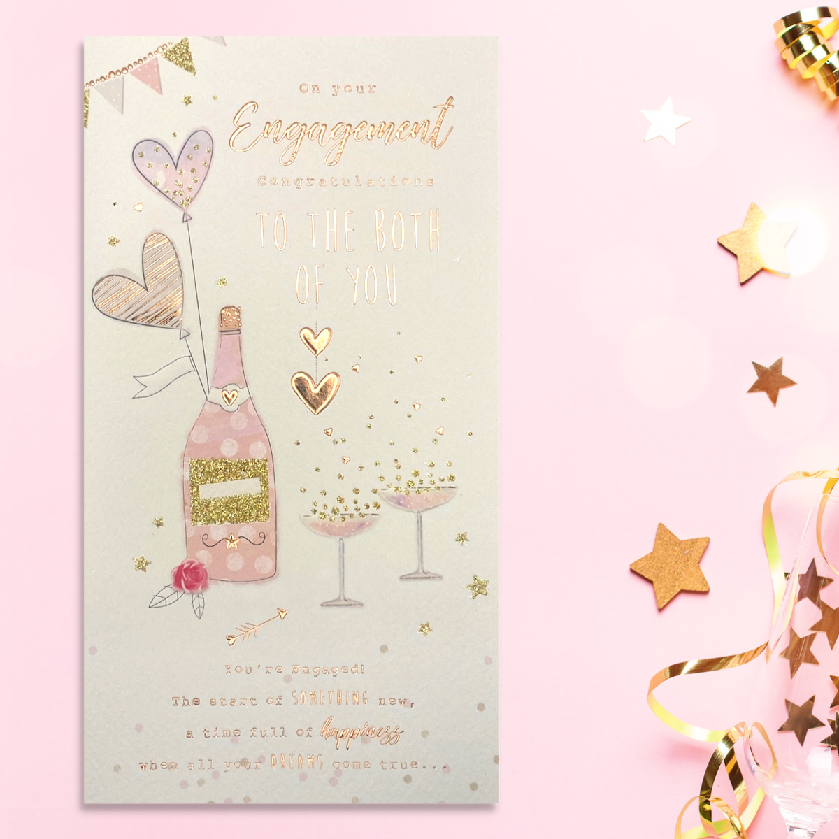 Slim engagement card with bottle of bubbly and glasses