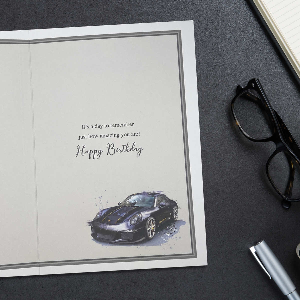 Inside image with grey border and car illustration beside verse